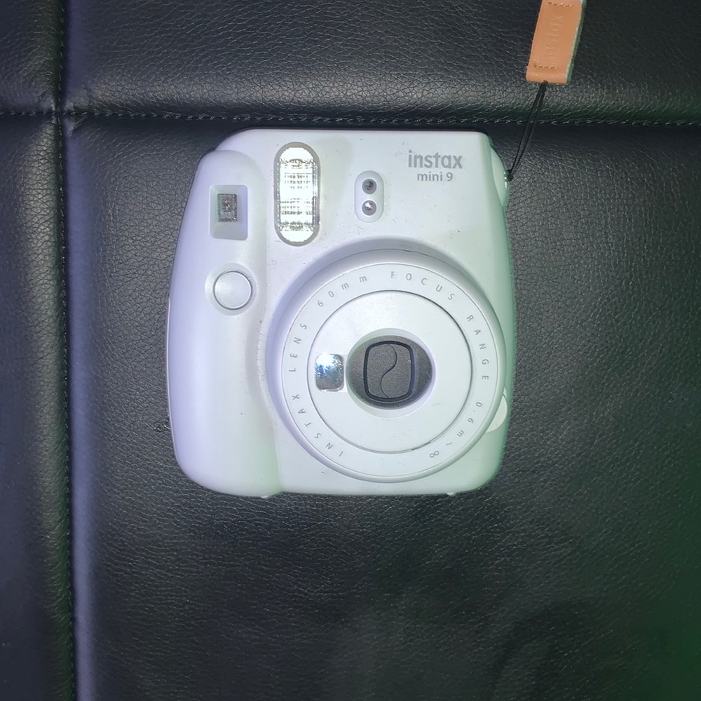 White/grey polaroid camera